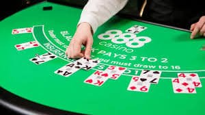 Mobile phone showing tajir365 live baccarat interface with bet placement and dealer camera